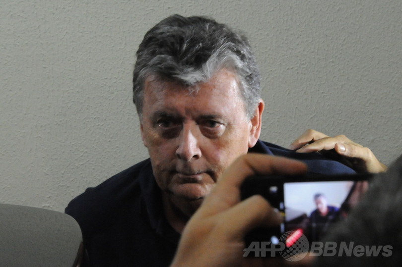W杯チケット転売容疑の企業幹部が出頭、ブラジル W杯チケット転売容疑の企業幹部が出頭、ブラジル