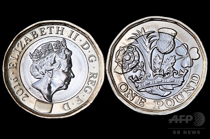英国、新1ポンド硬貨が流通開始へ 英国、新1ポンド硬貨が流通開始へ