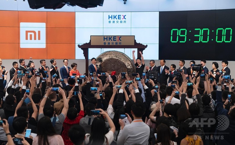 シャオミ香港でIPO 初値は発行価格下回る シャオミ香港でIPO 初値は発行価格下回る