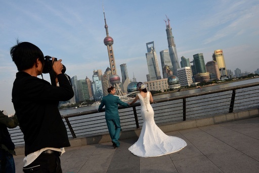 中国2大都市で離婚が急増、不動産税制の「抜け穴」狙う