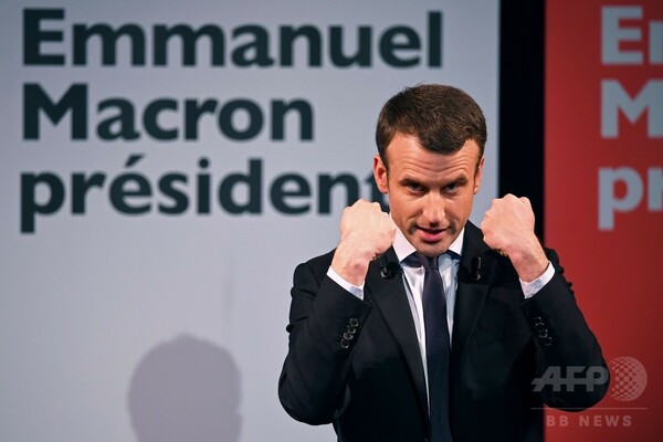 仏大統領選1回投票、マクロン氏が支持率でルペン氏抜く 世論調査