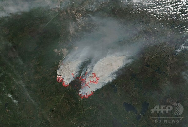 カナダ森林火災、延焼は食い止め 煙で石油生産再開できず