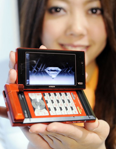 KDDI、3D対応「Woooケータイ」を発表