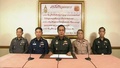 タイの首都バンコク（Bangkok）で、軍が全権を掌握すると宣言したプラユット・チャンオチャ（Prayut Chan-O-Cha）陸軍司令官（中央）のテレビ演説を映し出す画面の画像（2014年5月22日撮影）。(c)AFP/Thai television