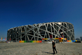 中国・北京（Beijing）のオリンピック公園（Olympic Park）にある、「鳥の巣（Bird&apos;s Nest）」の愛称を持つ北京五輪のメーンスタジアム、国家体育場（National Stadium、2008年8月2日撮影）。(c)AFP/TEH Eng Koon