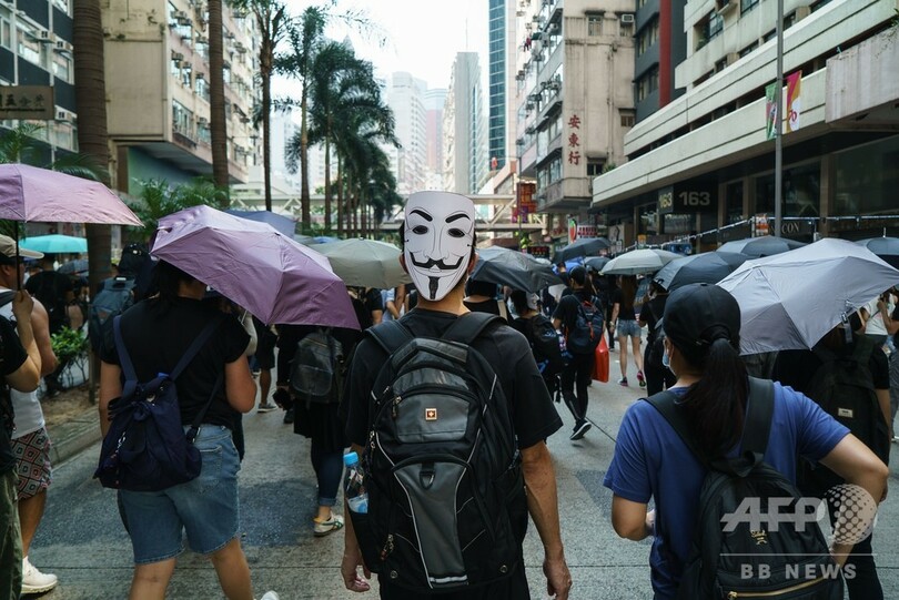 香港デモに「ガイ・フォークス」の仮面 新たなシンボルに