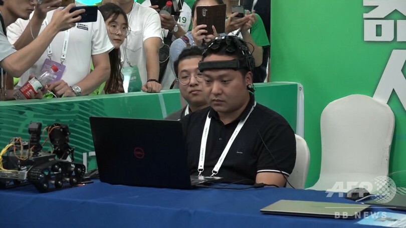 「脳波タイピング競争」で新記録、スマホの手入力を上回る