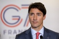 先進7か国（G7）首脳会議（サミット）が行われたフランス南西部ビアリッツで記者会見を行うカナダのジャスティン・トルドー首相（2019年8月26日撮影）。(c)Ludovic MARIN / AFP