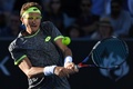 全豪オープンテニス、男子シングルス3回戦。リターンを打つデニス・イストミン（2017年1月21日撮影）。(c)AFP/GREG WOOD