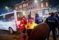 オランダ・ロッテルダムで暴動が発生し、対応に当たる警察（2021年1月25日撮影）。(c)Marco de Swart / ANP / AFP