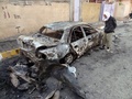 イラク北部キルクーク（Kirkuk）で起きた自動車爆弾攻撃の現場（2013年11月14日撮影）。(c)AFP/MARWAN IBRAHIM