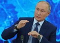 ロシアの首都モスクワ郊外ノボ・オガリョボの公邸でビデオリンクを通じて毎年恒例の記者会見を行うウラジーミル・プーチン大統領（2020年12月17日撮影）。(c)Mikhail Klimentyev / SPUTNIK / AFP