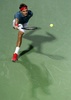 ドバイ・テニス選手権（Dubai Duty Free Tennis Championships 2014）、男子シングルス準決勝。リターンを打つロジャー・フェデラー（Roger Federer、2014年2月28日撮影）。(c)AFP/KARIM SAHIB