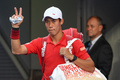 全豪オープンテニス、男子シングルス4回戦。コートに入場する錦織圭（2017年1月22日撮影）。(c)AFP/SAEED KHAN