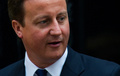 英ロンドンの首相官邸を出るデービッド・キャメロン首相（2010年9月13日撮影）。(c)CARL COURT / AFP