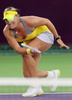女子テニス、カタール・トータル・オープン（Qatar Total Open 2013）は13日、ドーハ（Doha）でシングルス2回戦が行われ、ハンガリーのティメア・バボス（Timea Babos）は4-6、0-6で大会第6シードのサラ・エラーニ（Sara Errani、イタリア）に敗れた。

リターンを打つティメア・バボス（2013年2月13日撮影）。(c)AFP/AL-WATAN DOHA/KARIM JAAFAR