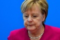 ドイツの首都ベルリンのキリスト教民主同盟本部で記者会見するアンゲラ・メルケル首相（2018年10月29日撮影）。(c)Tobias SCHWARZ / AFP
