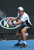 全豪オープンテニス、男子シングルス1回戦。バックハンドを打つアレックス・ボルト（2017年1月17日撮影）。(c)AFP/SAEED KHAN