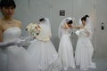 韓国・ソウル（Seoul）の加平（Gapyeong）で行われた統一教会（Unification Church）の合同結婚式に参加した新婦たち（2014年2月12日撮影）。(c)AFP/Ed Jones