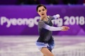 平昌冬季五輪、フィギュアスケート女子シングル・ショートプログラム（SP）の演技に臨むエフゲニア・メドベデワ（2018年2月21日撮影）。(c)AFP/Roberto SCHMIDT