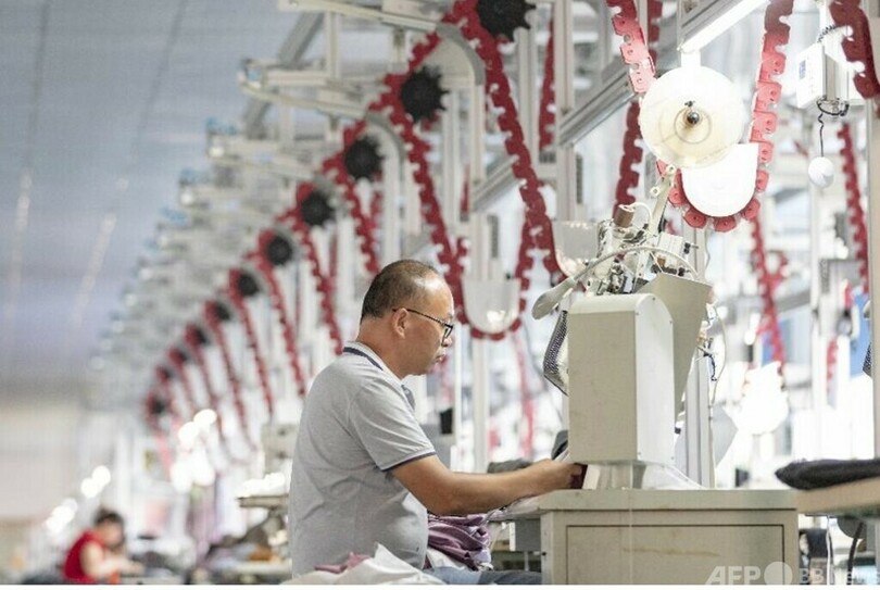 WTOの舞台で華やかな楽章を奏でる 中国