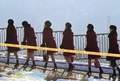 韓国・麟蹄の五輪施設に到着した北朝鮮の応援団員ら（2018年2月7日撮影）。(c) AFP PHOTO / JUNG Yeon-Je