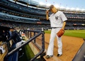 14MLB、ニューヨーク・ヤンキース（New York Yankees）対ボルチモア・オリオールズ（Baltimore Orioles）。初回を投げ終えてダグアウトに戻るニューヨーク・ヤンキースの田中将大（Masahiro Tanaka、2014年4月9日撮影）。(c)AFP/Getty Images/Jim McIsaac