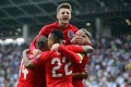 サッカー欧州選手権2016予選グループE、スロベニア対イングランド。得点を喜ぶイングランドの選手（2015年6月14日撮影）。(c)AFP/Jure Makovec