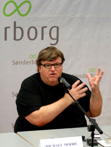 ムーア監督、デンマークで最新作『シッコ』をPR