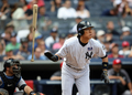 09MLB、ニューヨーク・ヤンキース対トロント・ブルージェイズ。2回に第12号ソロ本塁打を放つヤンキースの松井秀喜。（2009年7月4日撮影）(c)AFP/Getty Images/Nick Laham