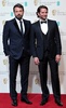 英国アカデミー賞（British Academy Film Awards）授賞式に出席した俳優／監督ベン・アフレック（Ben Affleck）と俳優ブラッドリー・クーパー（Bradley Cooper、2013年2月10日撮影）。(c)AFP/Carl COURT