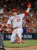 第86回MLBオールスターゲーム。プリンス・フィルダーの適時打で生還するア・リーグのマイク・トラウト（2015年7月14日撮影）。(c)AFP/Getty Images/Rob Carr