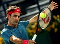 ドバイ・テニス選手権（Dubai Duty Free Tennis Championships 2014）、男子シングルス決勝。リターンを打つロジャー・フェデラー（Roger Federer、2014年3月1日撮影）。(c)AFP/MARWAN NAAMANI
