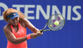 女子テニス、東レ・パンパシフィック・オープン、シングルス決勝。リターンを打つ大坂なおみ（2016年9月25日撮影）。(c)AFP/TORU YAMANAKA