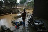 中国南部洪水で39人死亡、復旧作業進む中で新たな台風接近