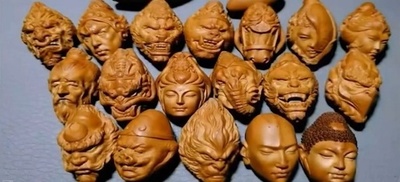 中国の大学1年生、オリーブの種に「西遊記」の人物を彫刻