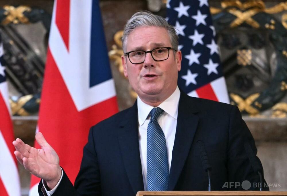極右には愛国心で対抗 英首相、リベラル派に呼び掛け