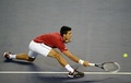 男子テニス、上海マスターズ（2014 Shanghai Rolex Masters）シングルス準決勝。リターンを狙うノバク・ジョコビッチ（Novak Djokovic、2014年10月11日撮影）。(c)AFP/JOHANNES EISELE