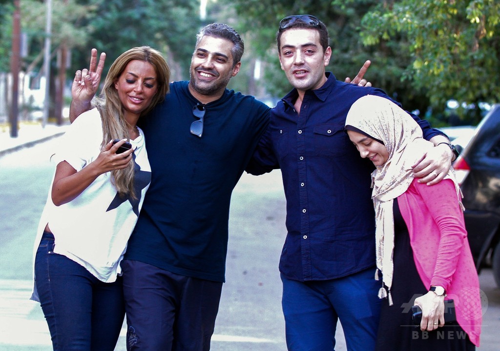 エジプトで収監のアルジャジーラ記者ら釈放、シシ大統領が恩赦 写真8枚 国際ニュース:AFPBB News