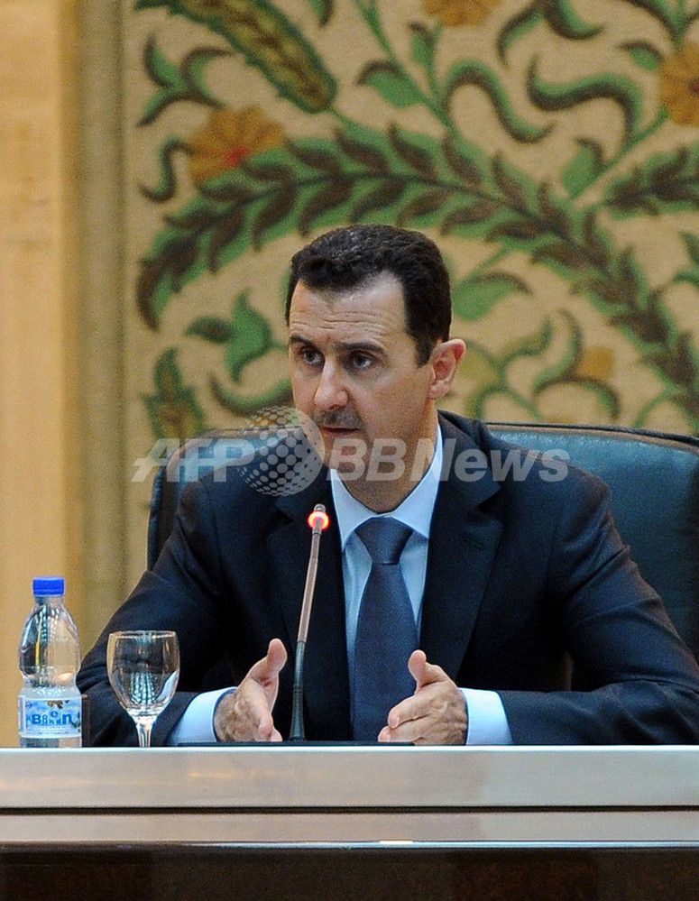 シリアは戦争状態」、アサド大統領 反体制派鎮圧を命じる 写真4枚 国際