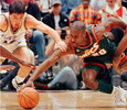 Seattle SuperSonics Gary Payton (R) fights for a loose ball with Utah Jazz player John Stockton (L) during game four of the NBA Western Conference Finals 26 May at the Delta Center in Salt Lake City, Utah. (c)AFP/Paul K. BUCK