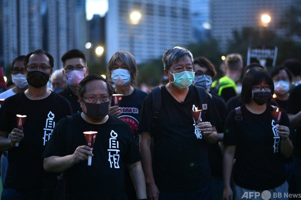 香港、天安門追悼集会参加の民主派9人に禁錮刑