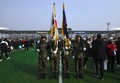 韓国・論山の訓練所で行われた入隊式典で、韓国旗と隊旗を掲げる韓国兵（2019年1月14日撮影）。(c)Jung Yeon-je / AFP