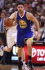 15-16NBA、ユタ・ジャズ対ゴールデンステイト・ウォリアーズ。ドリブルでボールを運ぶゴールデンステイト・ウォリアーズのクレイ・トンプソン（2015年11月30日撮影）。(c)AFP/Getty Images/George Frey