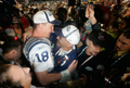 写真は、ヘッドコーチのトニー・ダンジー（%%Tony Dungy%%、右）と喜びを分かち合うマニング。(c)AFP/Getty Images Donald Miralle