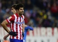 サッカースペイン国王杯（Copa del Rey 2013-14）準々決勝第1戦、アトレティコ・マドリード（Atletico Madrid）対アスレティック・ビルバオ（Athletic Bilbao）。試合中に笑顔を見せるアトレティコ・マドリードのジエゴ・コスタ（Diego da Silva Costa、2014年1月23日撮影）。(c)AFP/JAVIER SORIANO