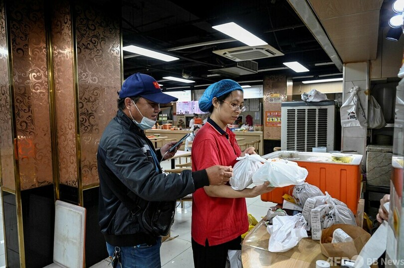 アルゴリズムとの闘い 中国の料理宅配ライダーたちの苦境