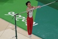 リオデジャネイロ五輪、体操男子予選。鉄棒の演技に臨む田中佑典（2016年8月6日撮影）。(c)AFP/Antonin THUILLIER