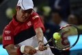 テニス、マドリード・オープン、男子シングルス準々決勝。リターンを打つ錦織圭（2015年5月8日撮影）。(c)AFP/JAVIER SORIANO