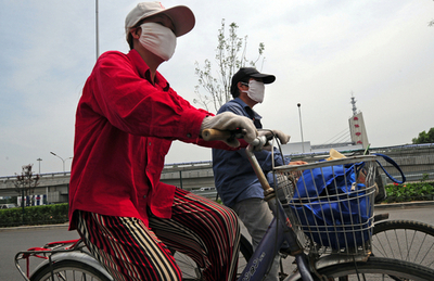 五輪控え、北京市内企業に就業時間短縮令